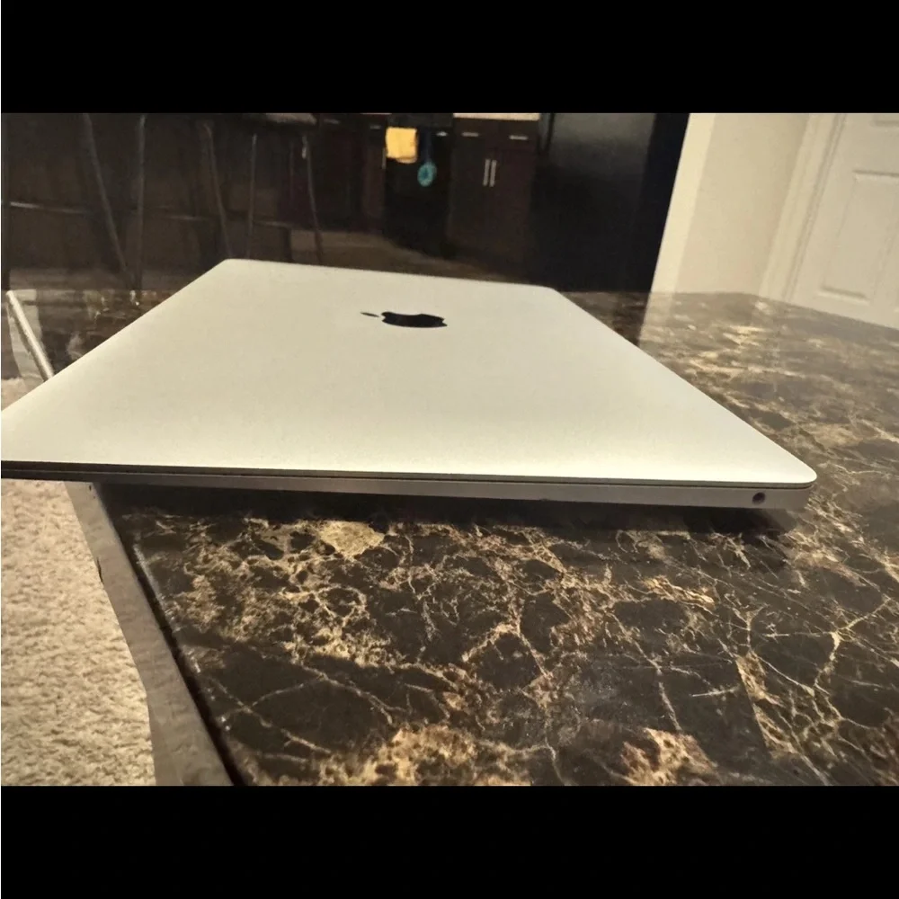 New Apple MacBook 13 inch 2020, 256 gb- Silver Just opener the box- new